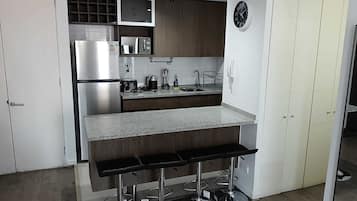 Microondas, horno y parrilla de estufa