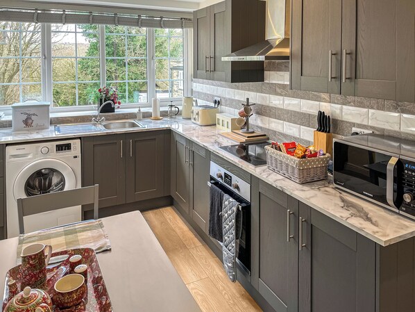 Imagen sin descripción, 1 de 11, botón