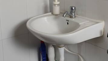 Shower, towels, soap, toilet paper