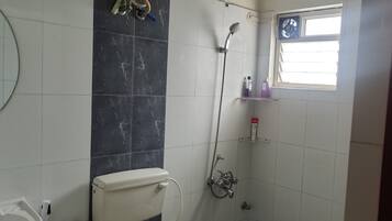 Shower, towels, soap, toilet paper