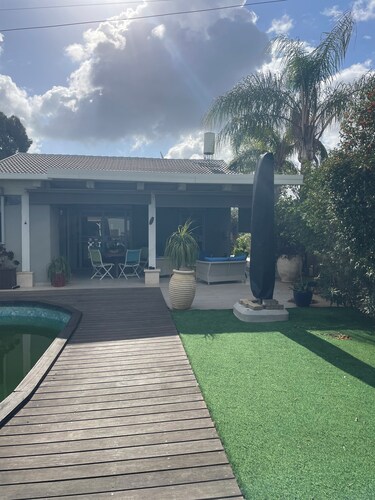 House between Sea and Country