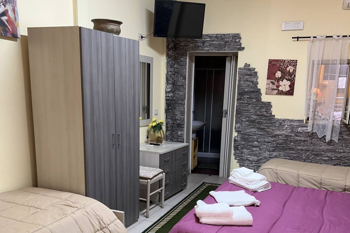 Deluxe Quadruple Room, Patio, City View