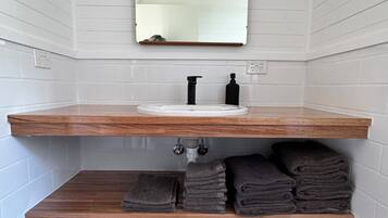 Hair dryer, towels, soap, toilet paper