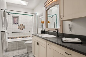 Hair dryer, towels, soap, toilet paper