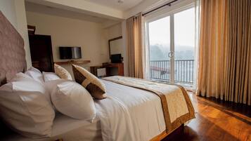 Desk, laptop workspace, iron/ironing board