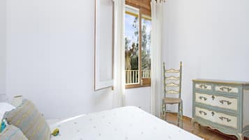 Apartamento | 2 dormitorios y tabla de planchar con plancha