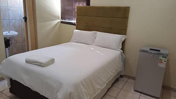 Chambre Deluxe | Fer et planche à repasser, accès au Wi-Fi (inclus)