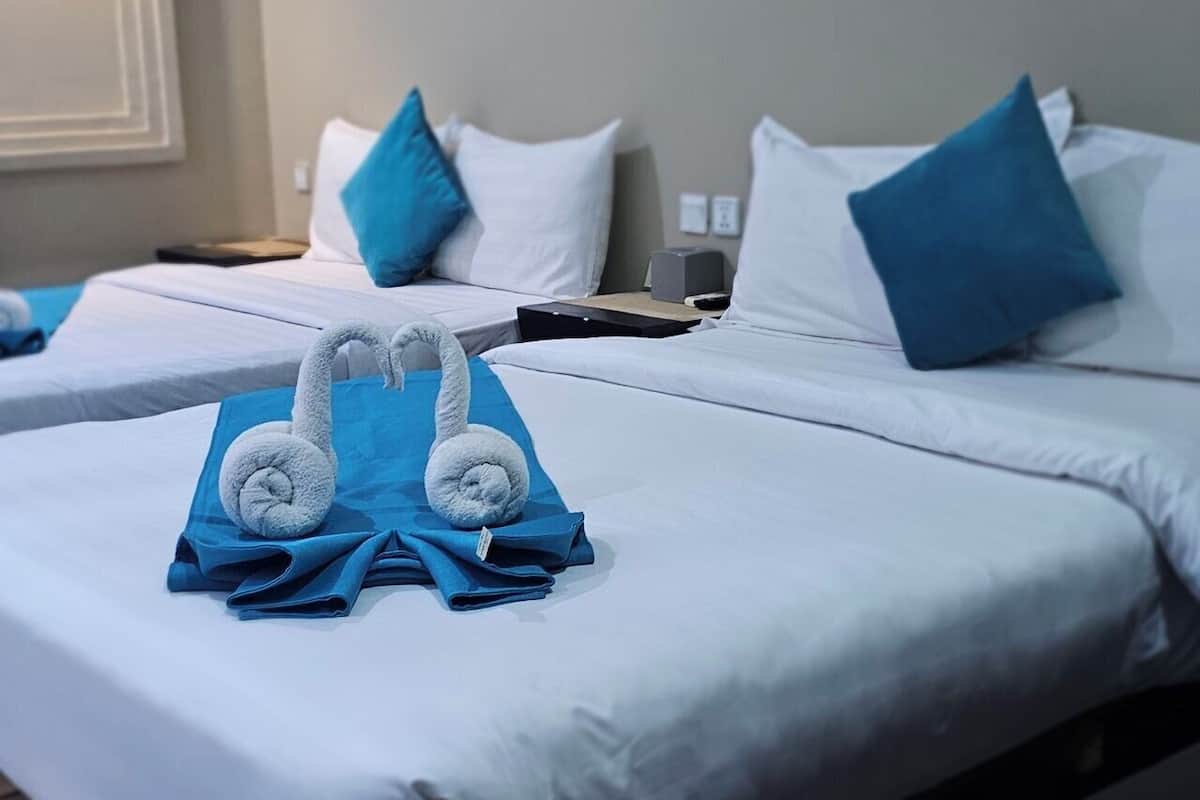 Habitación familiar | Sábanas de algodón egipcio, ropa de cama de alta calidad y wifi gratis