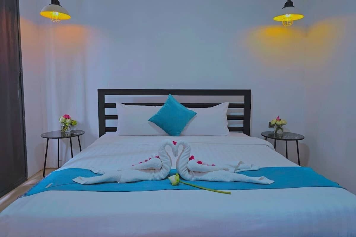Deluxe Queen Suite | Sábanas de algodón egipcio, ropa de cama de alta calidad y wifi gratis