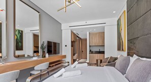 1 bedroom, desk, iron/ironing board, travel crib - Aesthetic Studio with Stunning Pool View in JVC (Dubai)
