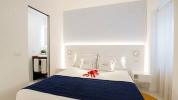 Egyptian cotton sheets, premium bedding, down duvets, pillow-top beds