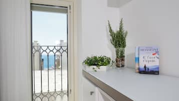 Superior Room, Partial Sea View | Living area | 42-inch Smart TV with satellite channels