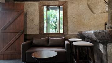 Waterfall Side Stone Cottage | Living area | Flat-screen TV