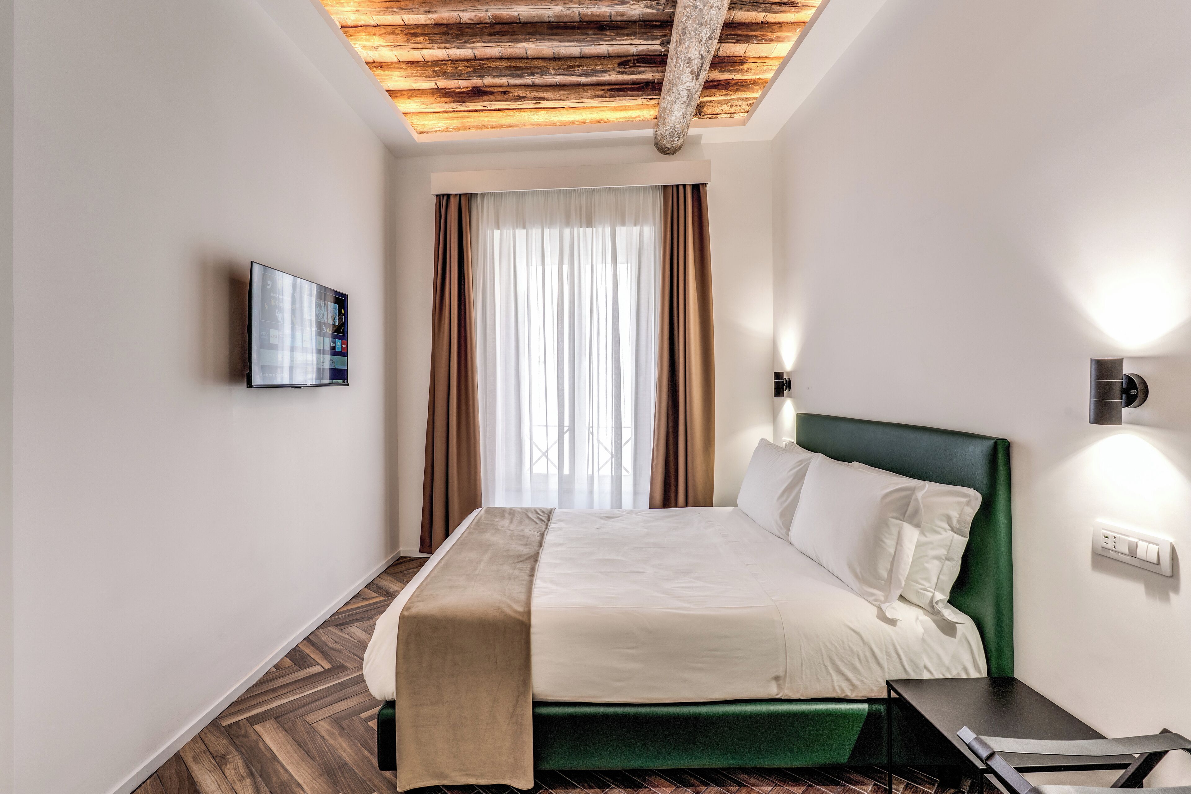 Deluxe Room, City View | In-room safe, desk, laptop workspace, blackout curtains