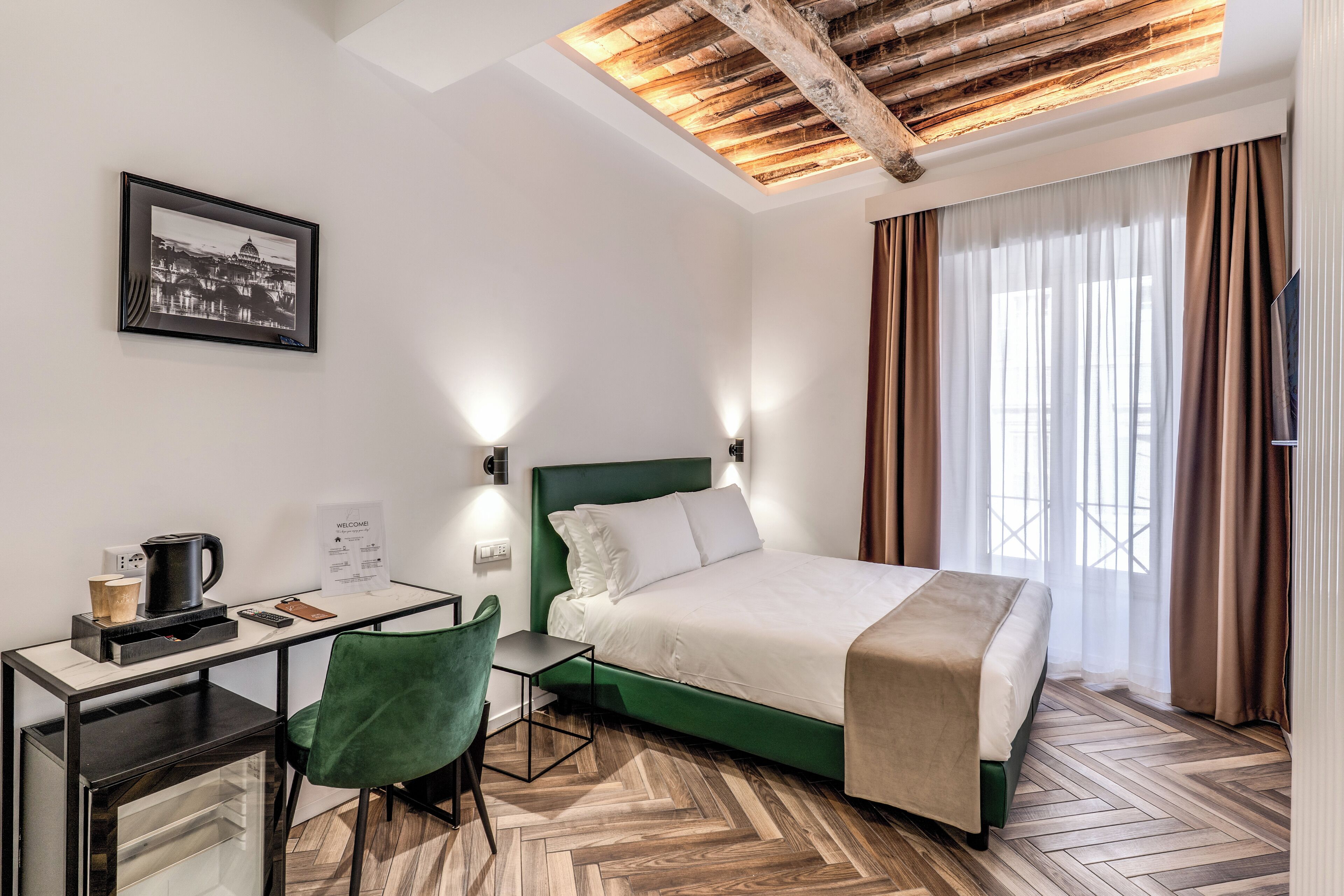 Deluxe Room, City View | In-room safe, desk, laptop workspace, blackout drapes