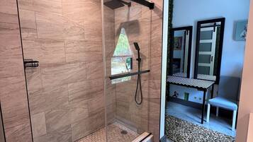 Shower, hair dryer, towels, soap