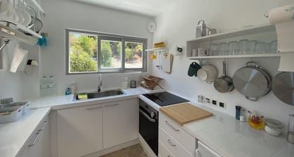 A beautifully renovated summer home, with all amenities and a spectacular view.