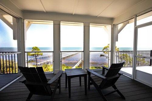 Bayfront oasis with private dock, pool, elevator and easy ADA beach access.