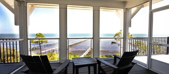 Bayfront oasis with private dock, pool, elevator and easy ADA beach access.