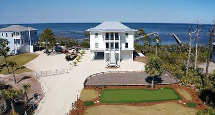 Bayfront oasis with private dock, pool, elevator and easy ADA beach access.