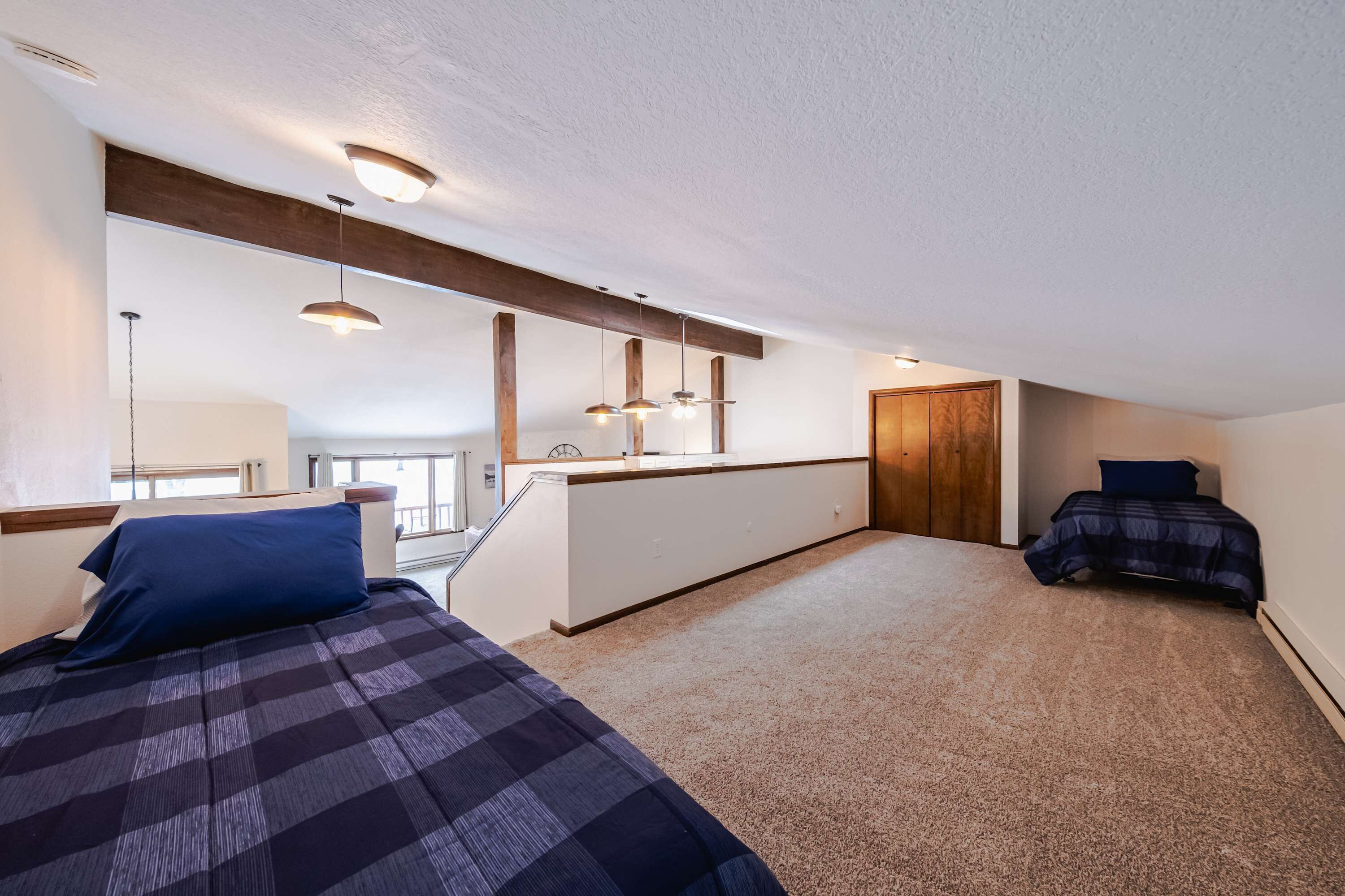 Townhome, Multiple Beds, Patio, Mountain View (Glacier Vista Golf Getaway) | 2 bedrooms, individually decorated, individually furnished