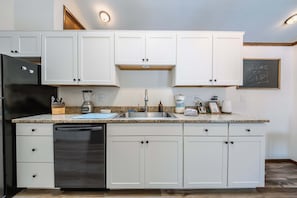 Townhome, Multiple Beds, Patio, Mountain View (Glacier Vista Golf Getaway) | Private kitchen | Fridge, microwave, oven, stovetop
