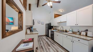 Townhome, Multiple Beds, Patio, Mountain View (Glacier Vista Golf Getaway) | Private kitchen | Fridge, microwave, oven, stovetop