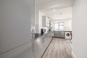 Family House, Non Smoking, Patio | Private kitchen - Chic and Comfy 4 Bedroom Stay Baylis (Slough)