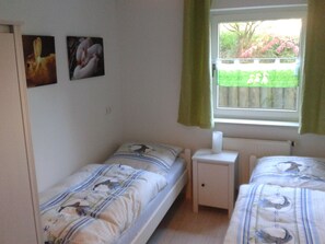 2 bedrooms, travel crib, WiFi, bed sheets