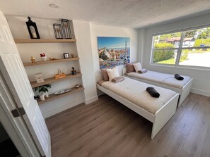 4 habitaciones, tabla de planchar con plancha, wifi y ropa de cama 