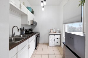 Microwave, stovetop, coffee/tea maker, toaster