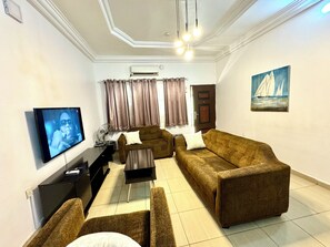 43-inch Smart TV with digital channels, streaming services - FURNISHED APARTMENTS Annex (Abuja)