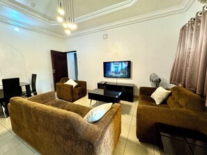 43-inch Smart TV with digital channels, streaming services - FURNISHED APARTMENTS Annex (Abuja)