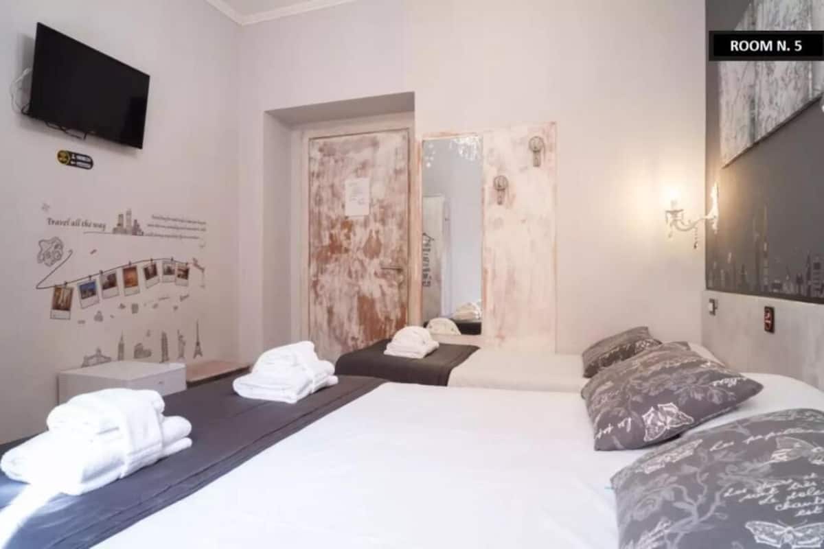 City Triple Room, Courtyard View | In-room safe, desk, laptop workspace, free WiFi