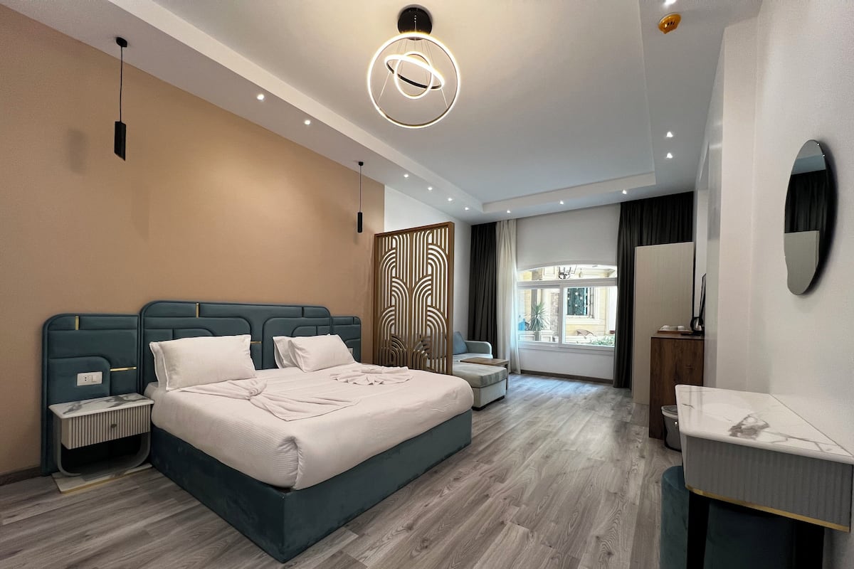 Junior Suite, 1 Queen Bed with Sofa bed, Ground Floor | Minibar (free items), in-room safe, blackout drapes, soundproofing