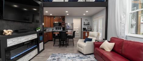 Smart TV, fireplace, books