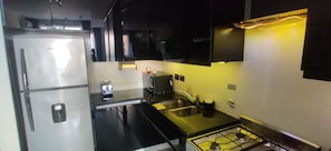Fridge, microwave, oven, stovetop
