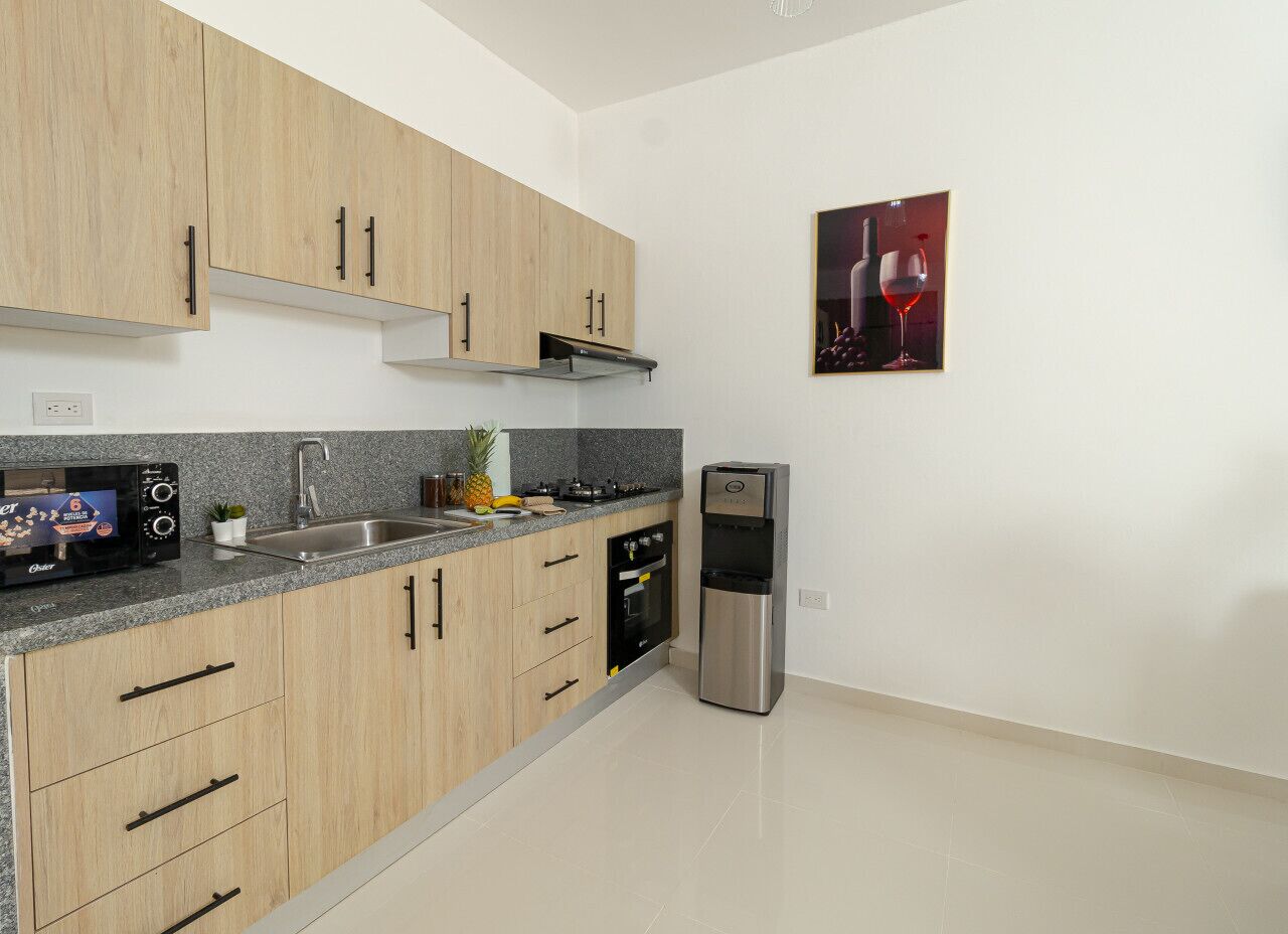 Coffee/tea maker, fridge, microwave, oven