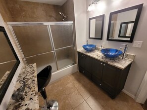 Shower, hair dryer, towels, soap