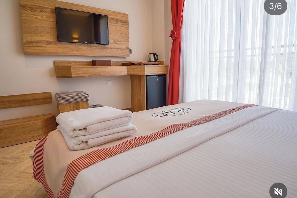 Standard Room, Pool View | Minibar, in-room safe, WiFi (free), bed sheets