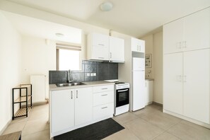 Studio, balcon | Cuisine privée