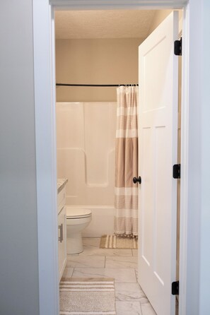 Hair dryer, towels, soap, shampoo