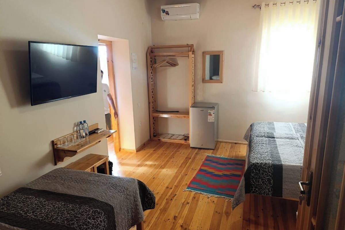 Standard Triple Room, City View | Desk, free WiFi