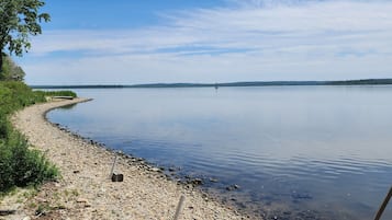 On the beach, sun-loungers