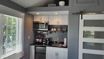 Fridge, microwave, coffee/tea maker, toaster