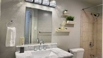 Hair dryer, towels, soap, shampoo