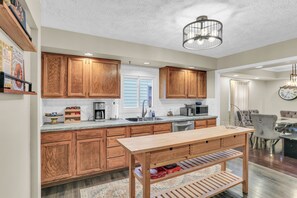 Fridge, microwave, oven, stovetop - The Charming Home: 3-bedroom house, blocks to downtown Champaign, with WiFi, AC (Champaign)