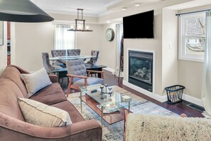 TV, fireplace - The Charming Home: 3-bedroom house, blocks to downtown Champaign, with WiFi, AC (Champaign)