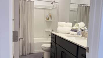 Hair dryer, towels, soap, toilet paper