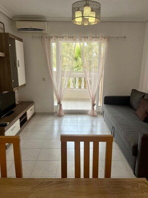 Living area - Apartment 'Con Piscina' with Shared Pool, Wi-Fi and Air Conditioning (La Mata)